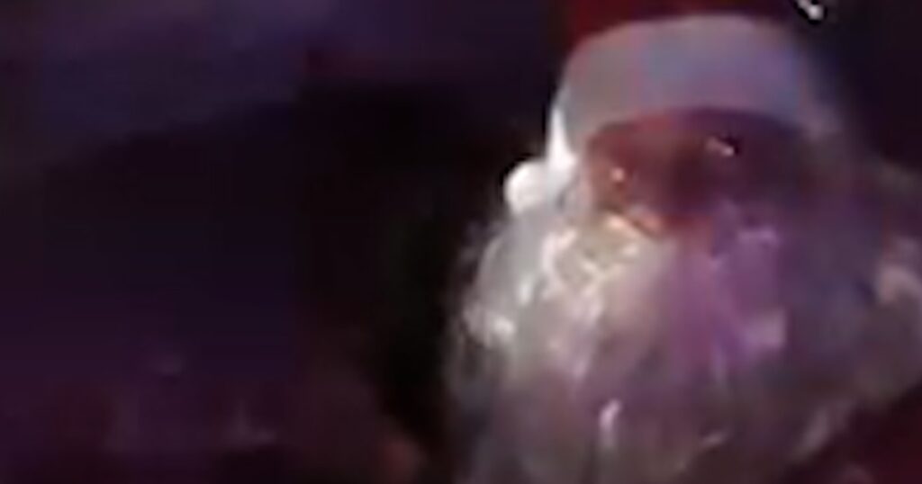 Body camera captures man dressed as santa as he parks
