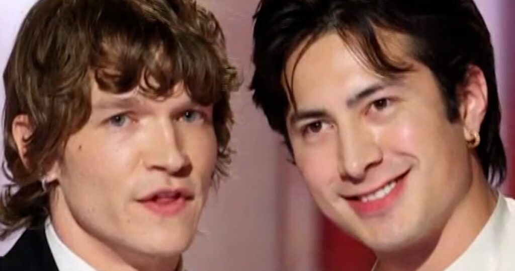 'heated rivalry' stars run with olympic torch