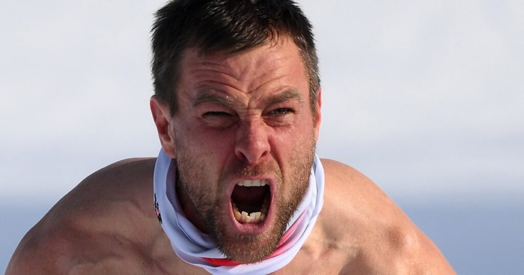 Austria's karl celebrates momentary victory shirtless