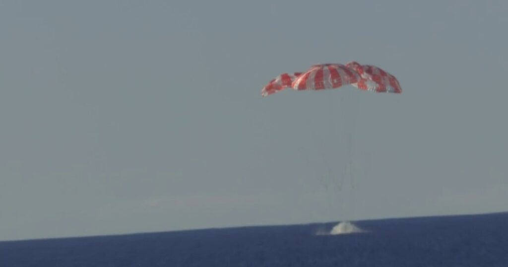 Artemis ii splashes down in the pacific ocean after a
