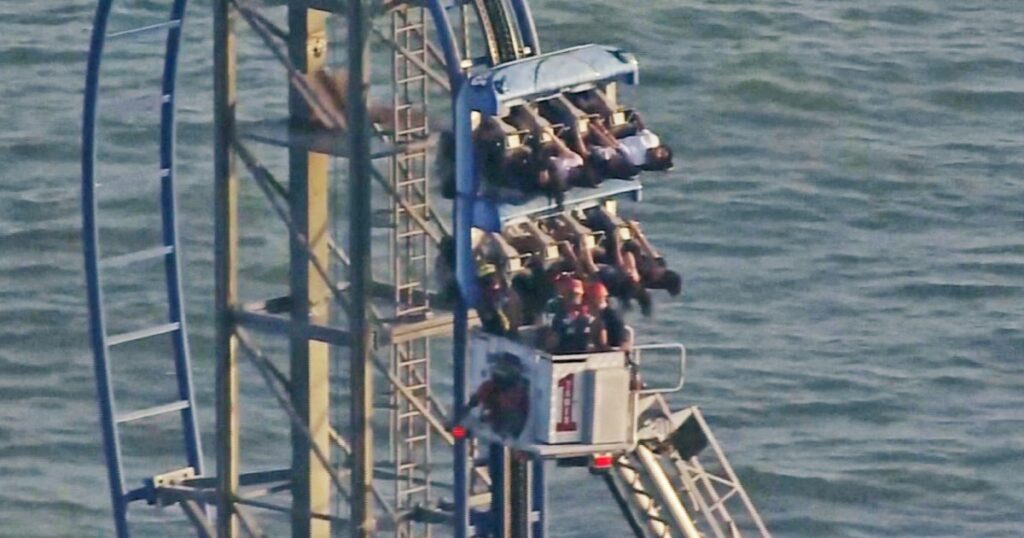 Eight passengers stranded 100 feet in the air for hours
