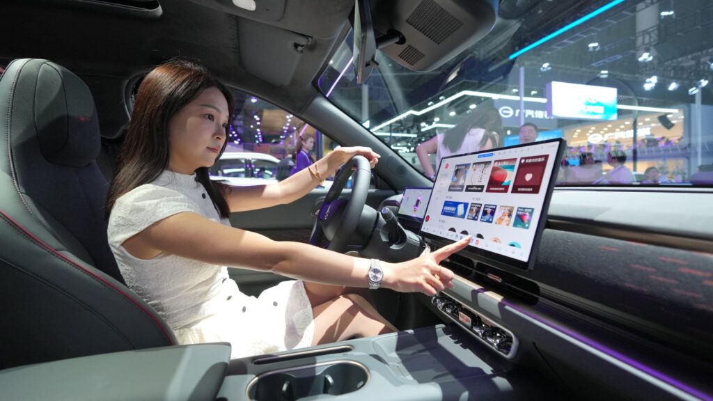 China car buyers prioritize tech over price: Bain