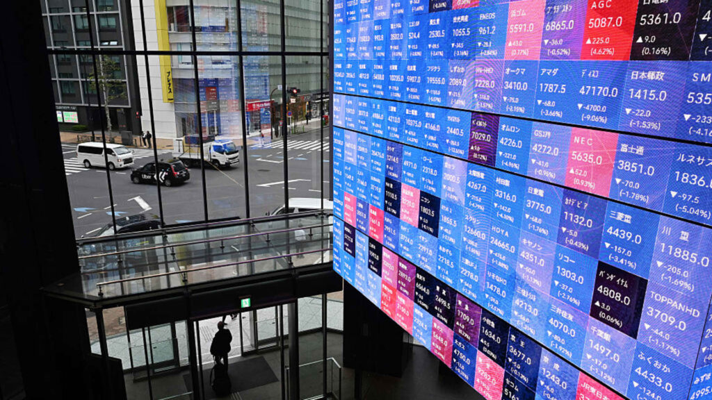 Japanese stocks rose as bond yields and the yen fell